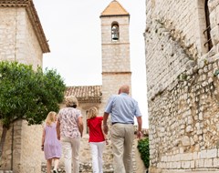 Two couples sightseeing in St. Paul de Vence, France