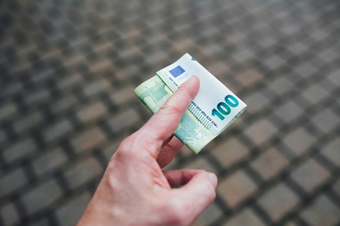 Expert Money Tip Cobblestone Street Currency Hand