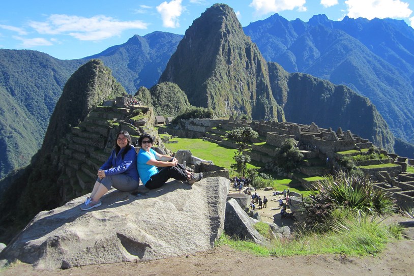 Peru Machu Picchu Two Women Posing At The Top