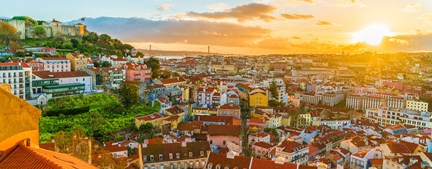 See a gorgeous Lisbon sunset over the city's red roofs on a guided tour of Portugal.