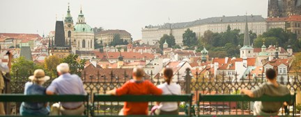 Czech Republic Prague People On Park Bences Overlooking Cityscape
