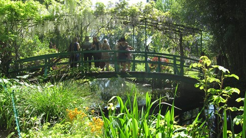 People on bridge in Monet's garden, Giverny, France