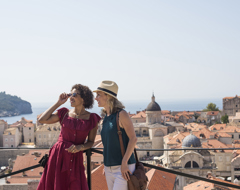 Croatia Dubrovnik Two Women Looking Over Rooftops