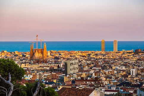 Cityscape of Barcelona with pink sky, Spain
