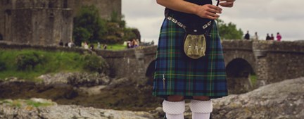 Piper and kilt from the waist down, Scotland