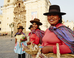 Peru Women With Baskets In Plaza Outside Church