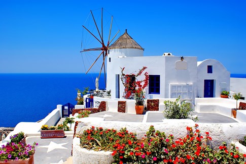 Windmill in Oia village, Santorini Island, Greece
