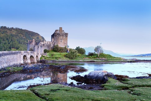 Eilean Donan Castle with sky and water, Scottish Highlands, Scotland
