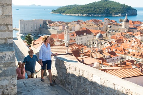 Tourists walking up stairs in Dubrovnik, Croatia