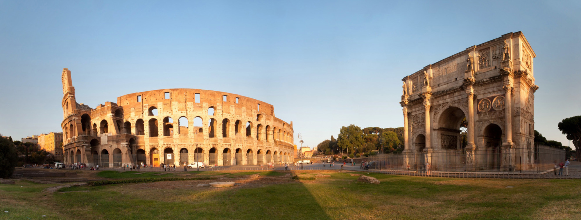Italy Rome Colosseum And Arch In Sunshine Panorama