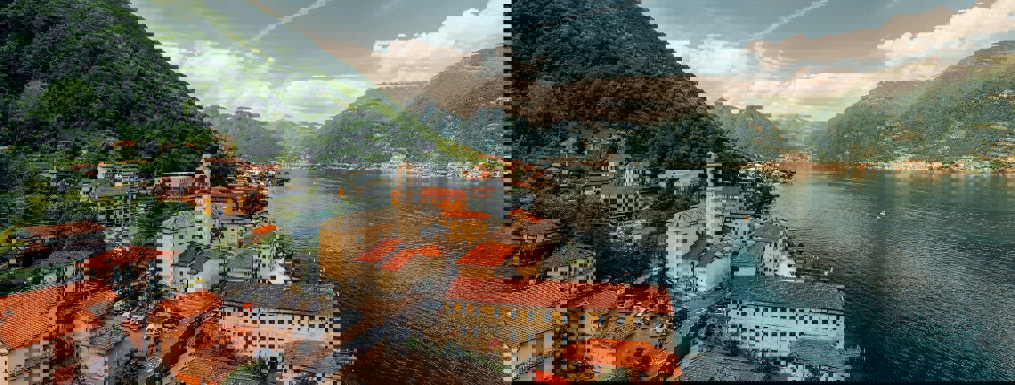 Italy Lake District Como Mountains Buildings Water Landscape Colorful Houses Red Roofs Birds Eye View Shore Church