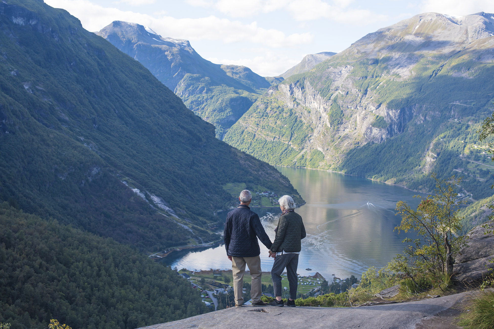Scandinavia River Mountains Tourist Couple Holding Hands