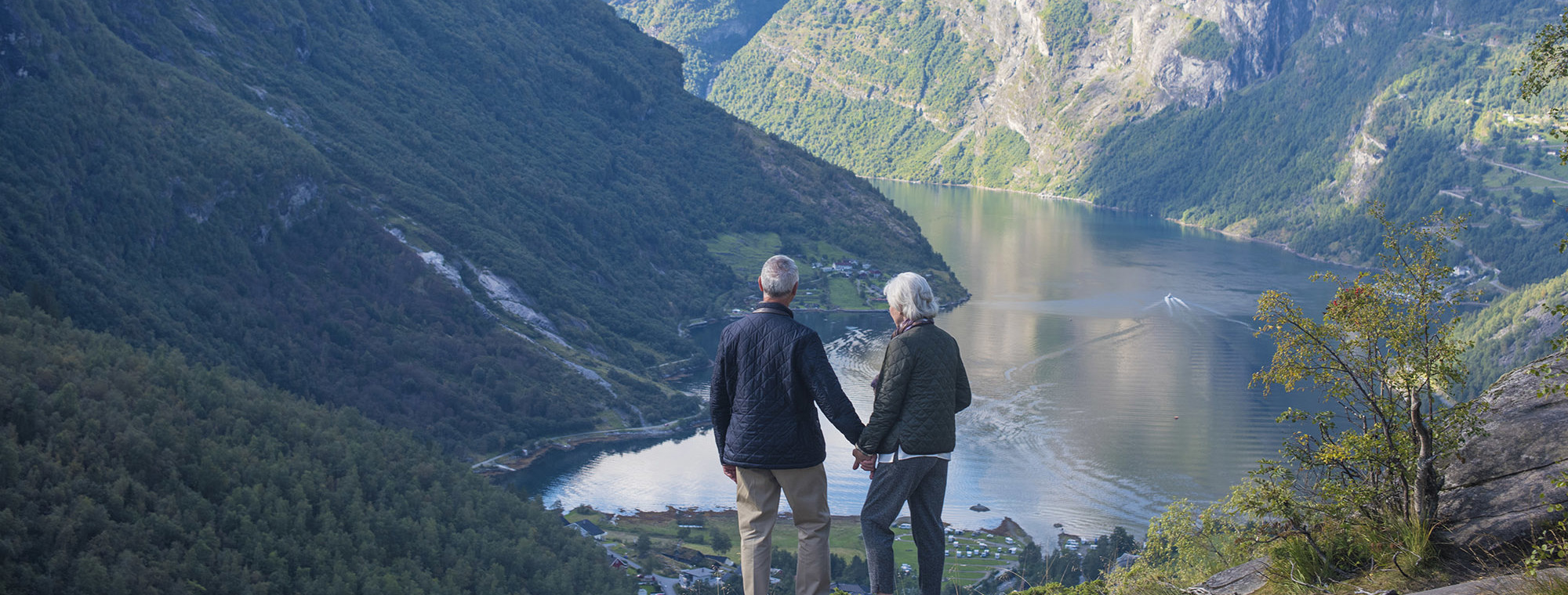 Scandinavia River Mountains Tourist Couple Holding Hands