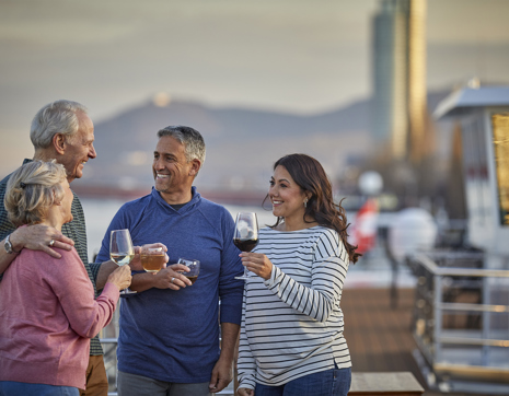 Uniworld River Cruise Sundeck Sunset Couples Toasting Wine