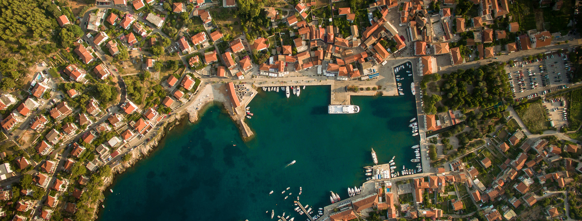 Croatia Aerial View Bay Water Blue Red Roofs Green Town Sea