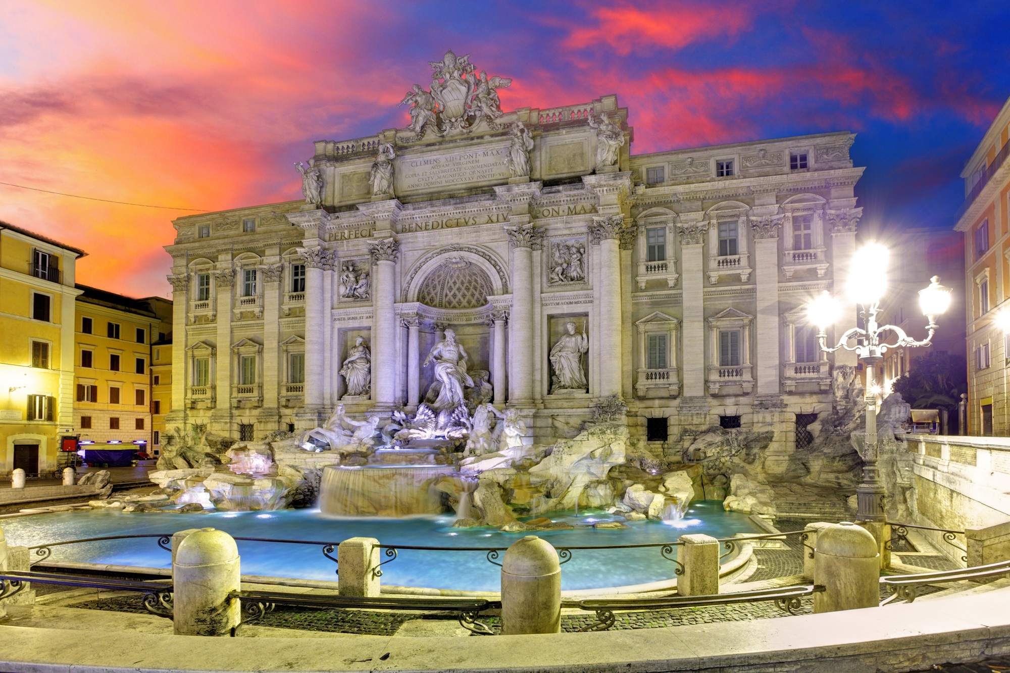 Itlay Rome Trevi Fountain At Sunset With Colorful Sky