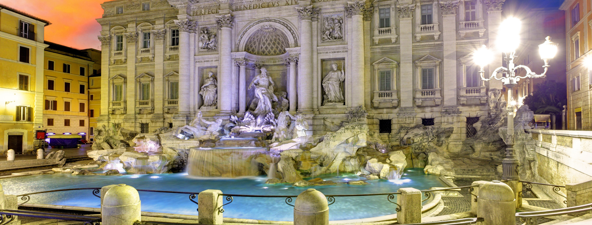 Itlay Rome Trevi Fountain At Sunset With Colorful Sky