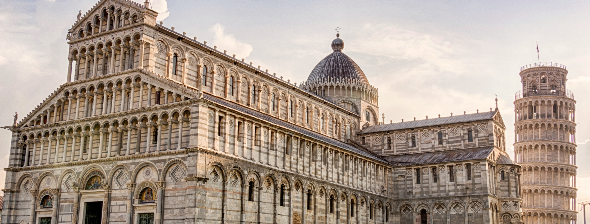 In Italy, Pisa's Square Of Miracles with the Leaning Tower and Cathedral are top sites for travelers exploring on guided tours