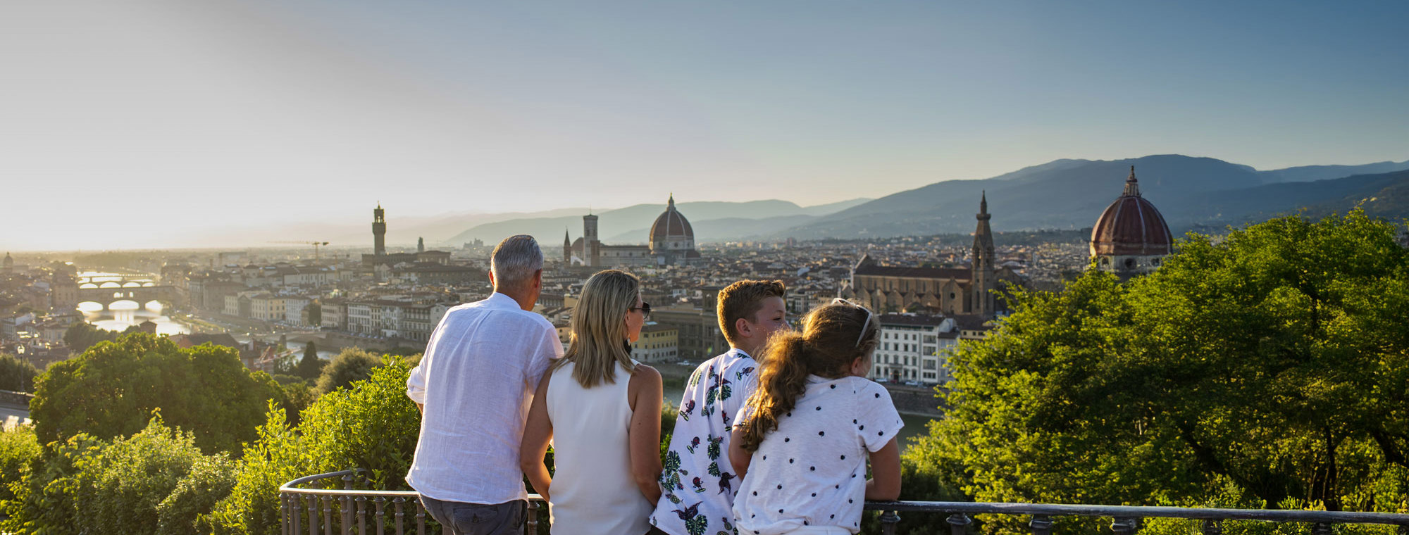 Family Looking Out Over Florence Duomo Cityscape