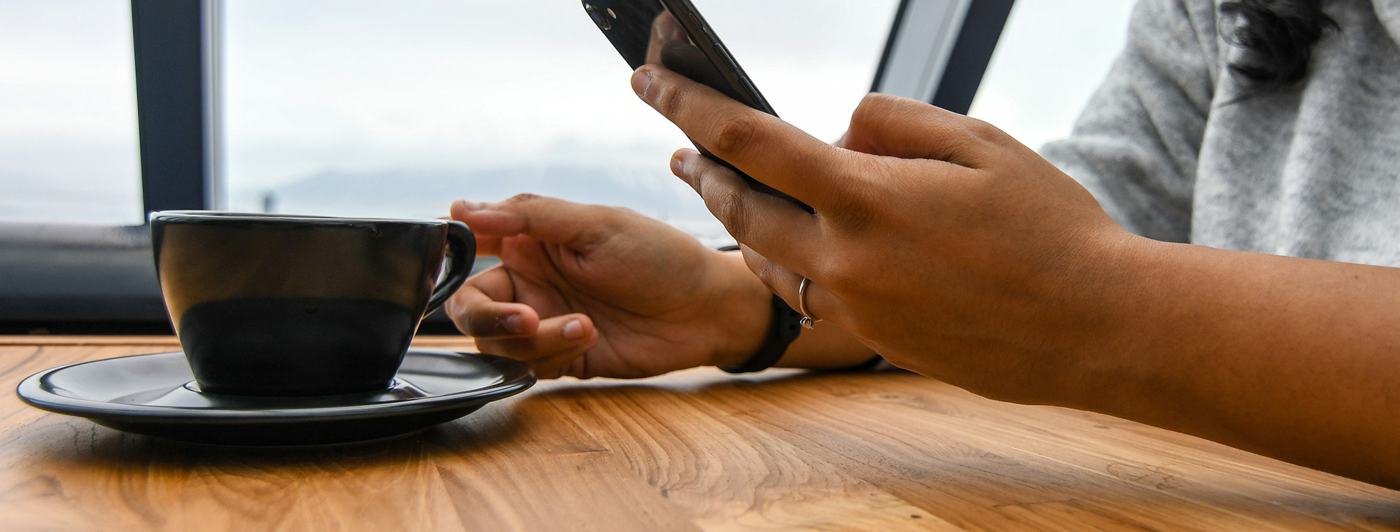 Expert Tech Cellphone Tipping Coffee Woman Table
