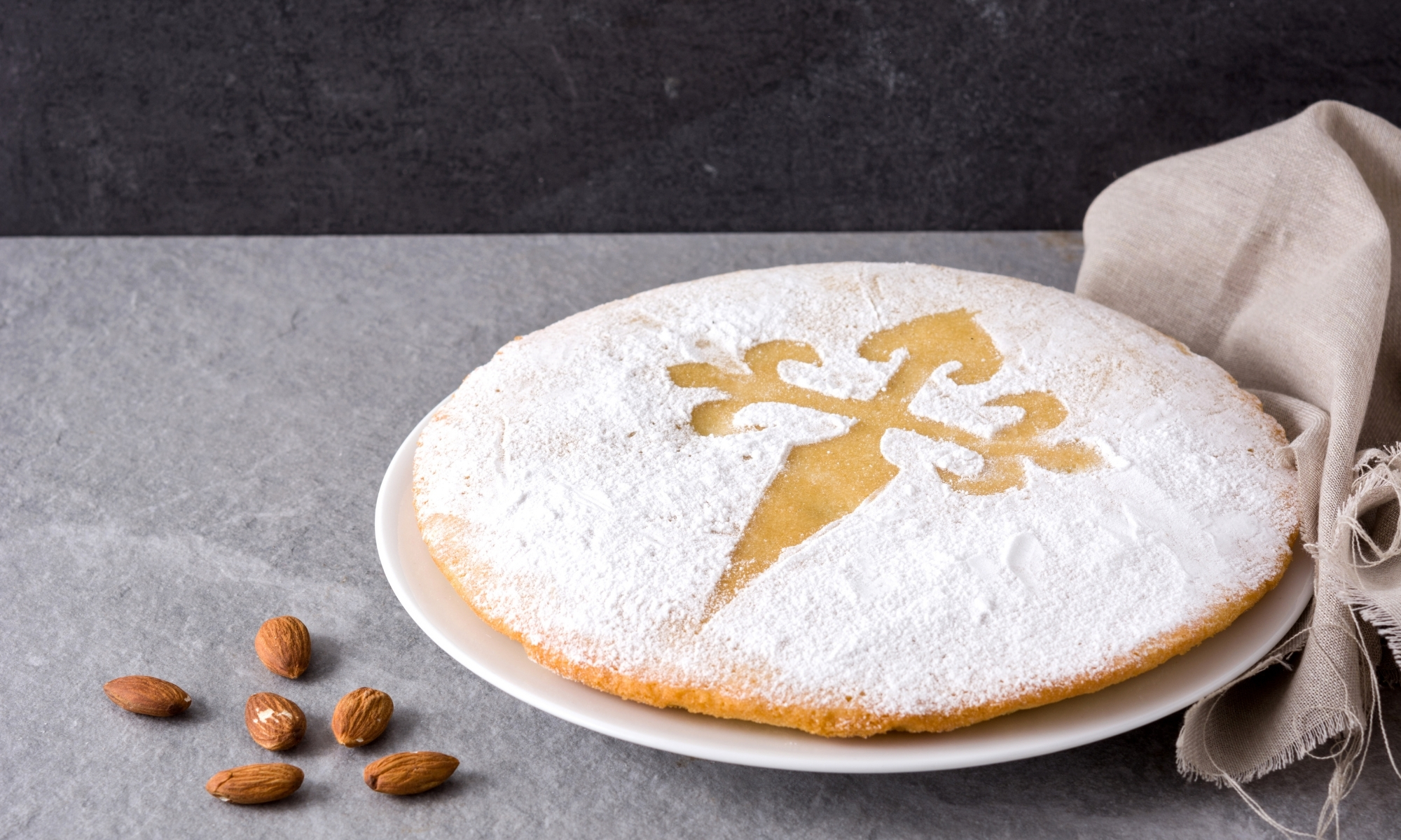 Spanish Tarta De Santiago Top Foods To Try In Spain Expert Travel Advice Spain Culinary Traditions