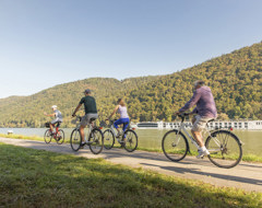 Expert River Princess People On Bicycles Near Waterway Uw