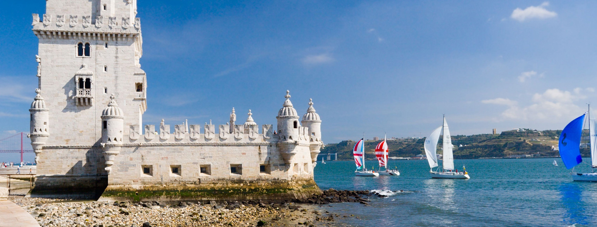 Portugal Lisbon Tower Of Belem With Boats On Water