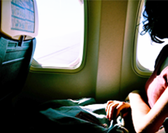 Expert Health Yoga Airplane Woman Jetlag