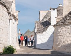 Italy Alberbello Guests Travel Director Walking Path Trulis