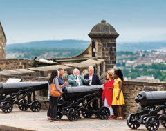 Scotland Edinburgh Castle Tourists With Cannon