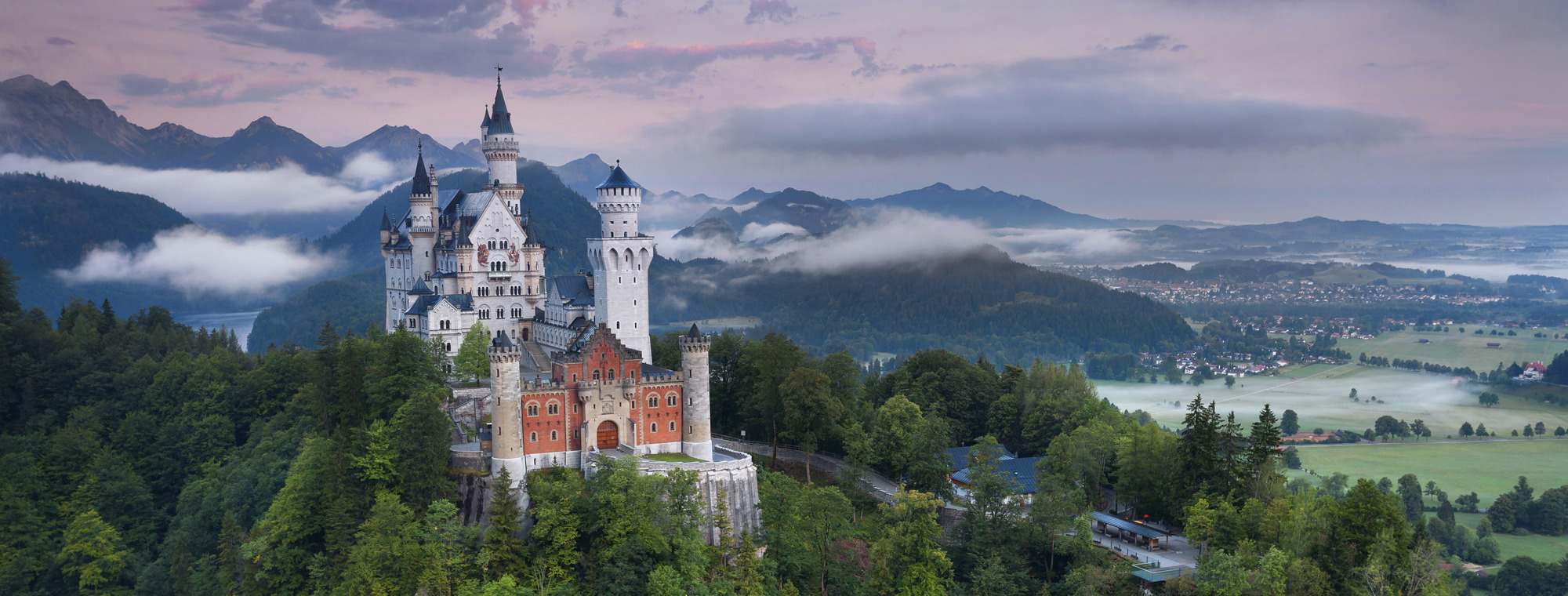 Germany Neuschwanstein Castle Among Trees And Clouds