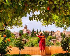 Spain Woman At The Alhambra Orange Tree Flowers Shade