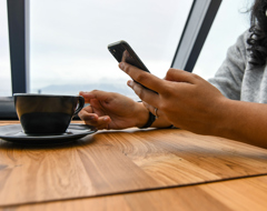 Expert Tech Cellphone Tipping Coffee Woman Table