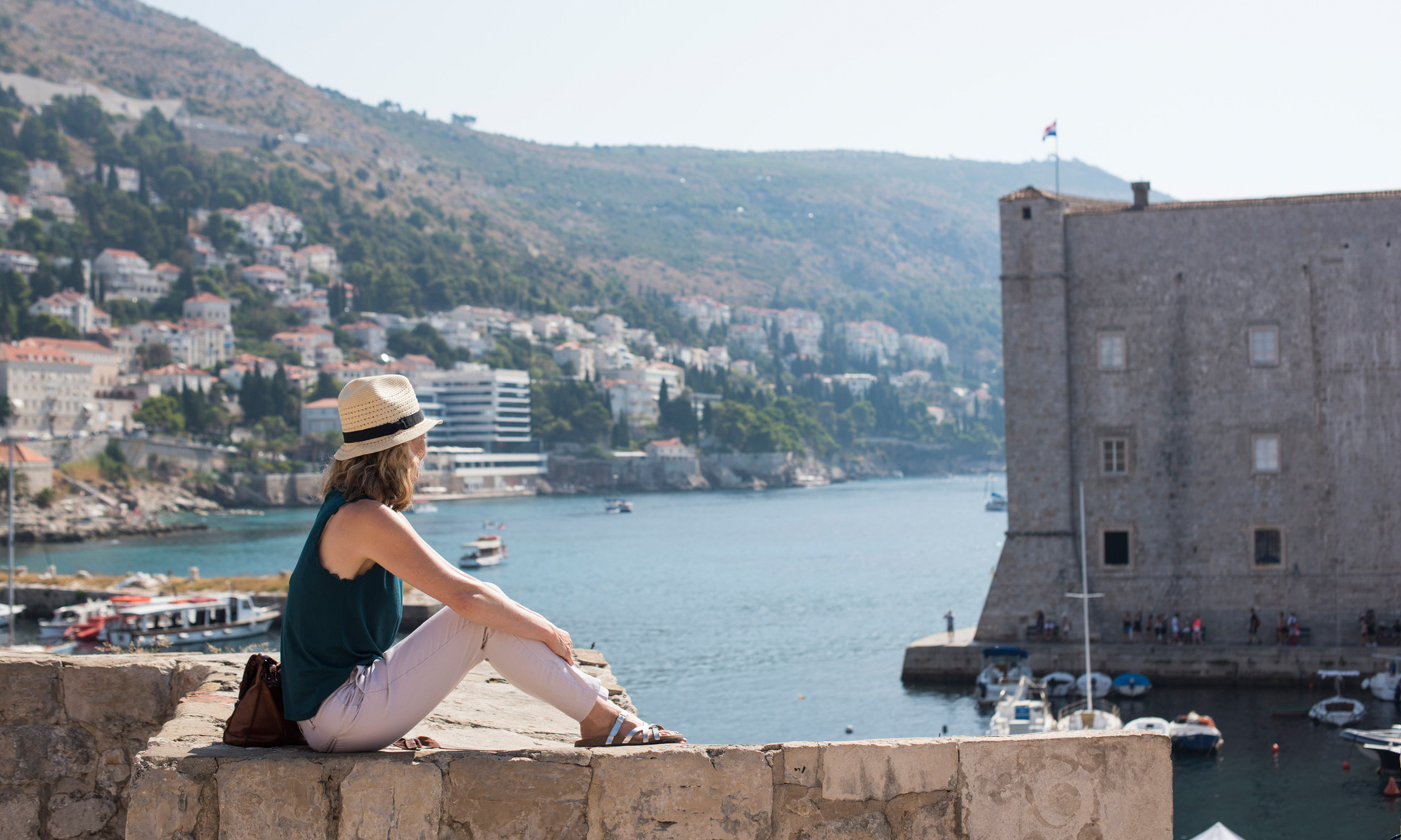 Croatia Marina Solo Traveler Woman Boats Hat Sea Bay Expert Wall Sitting